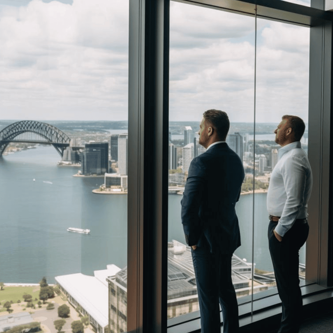 Sydney Car Loan Staff Looking out on The Harbour Bridge